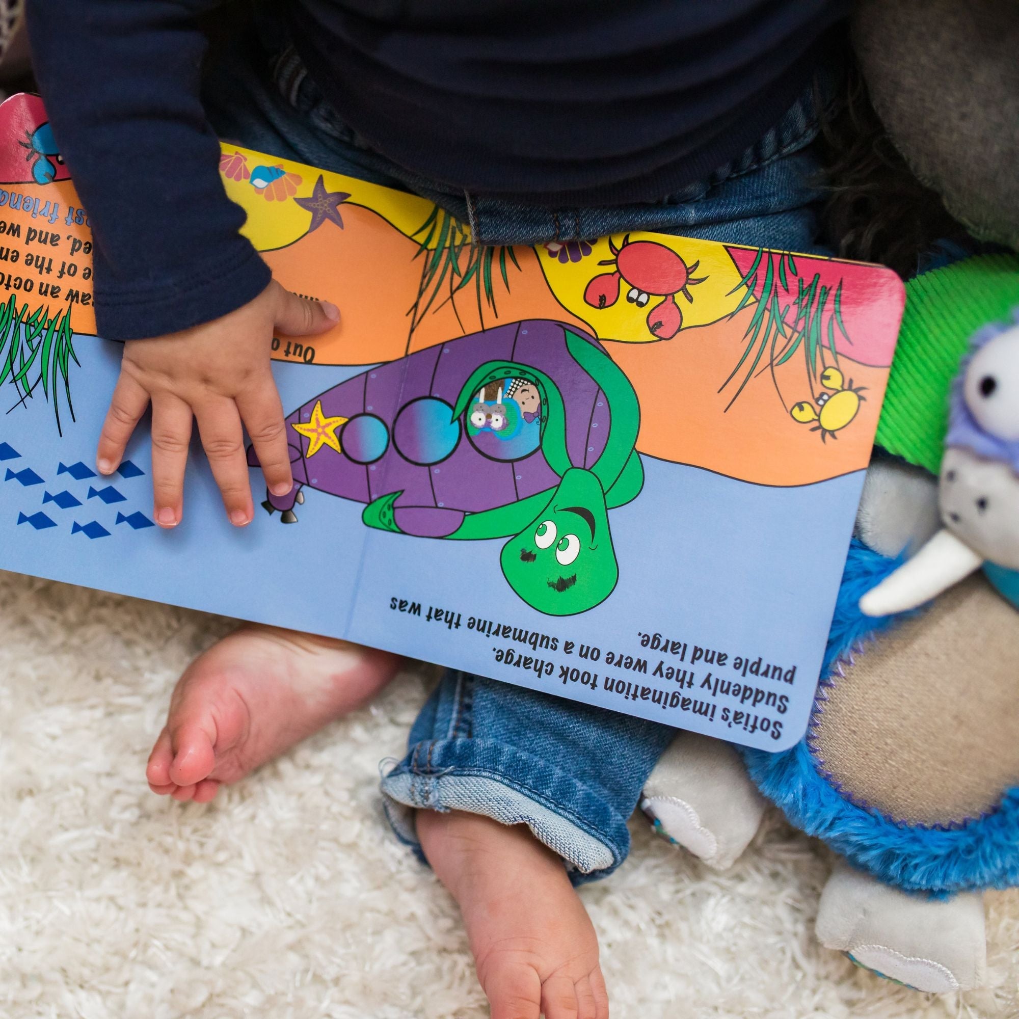 Gus the Toothy Tusked Rus Inklings Baby plush toy – neon blue green purple sensory stuffed animal with crinkle ears for newborns- colorful interior book octopus